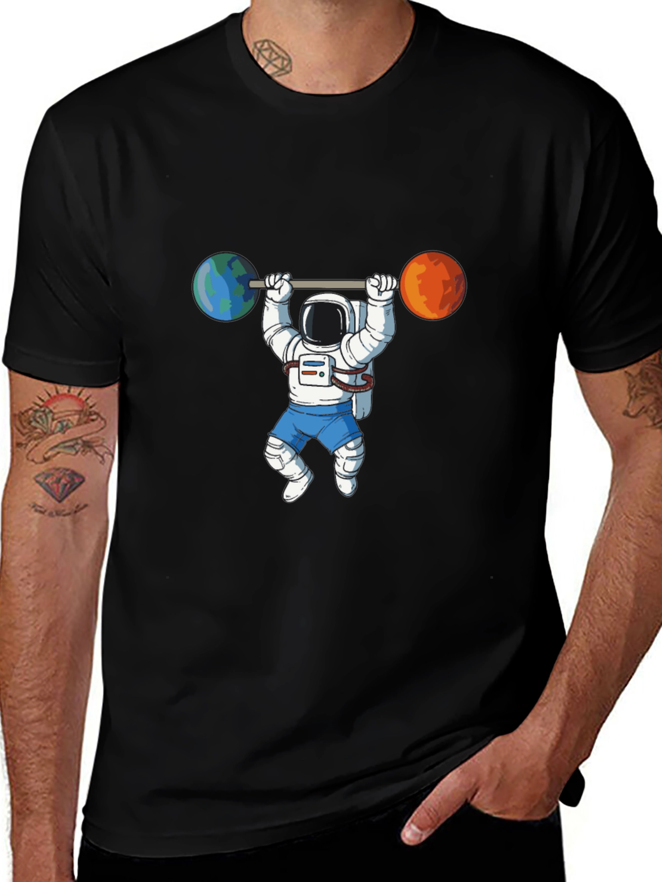 Astronaut Lifting Planets Graphic Tee
