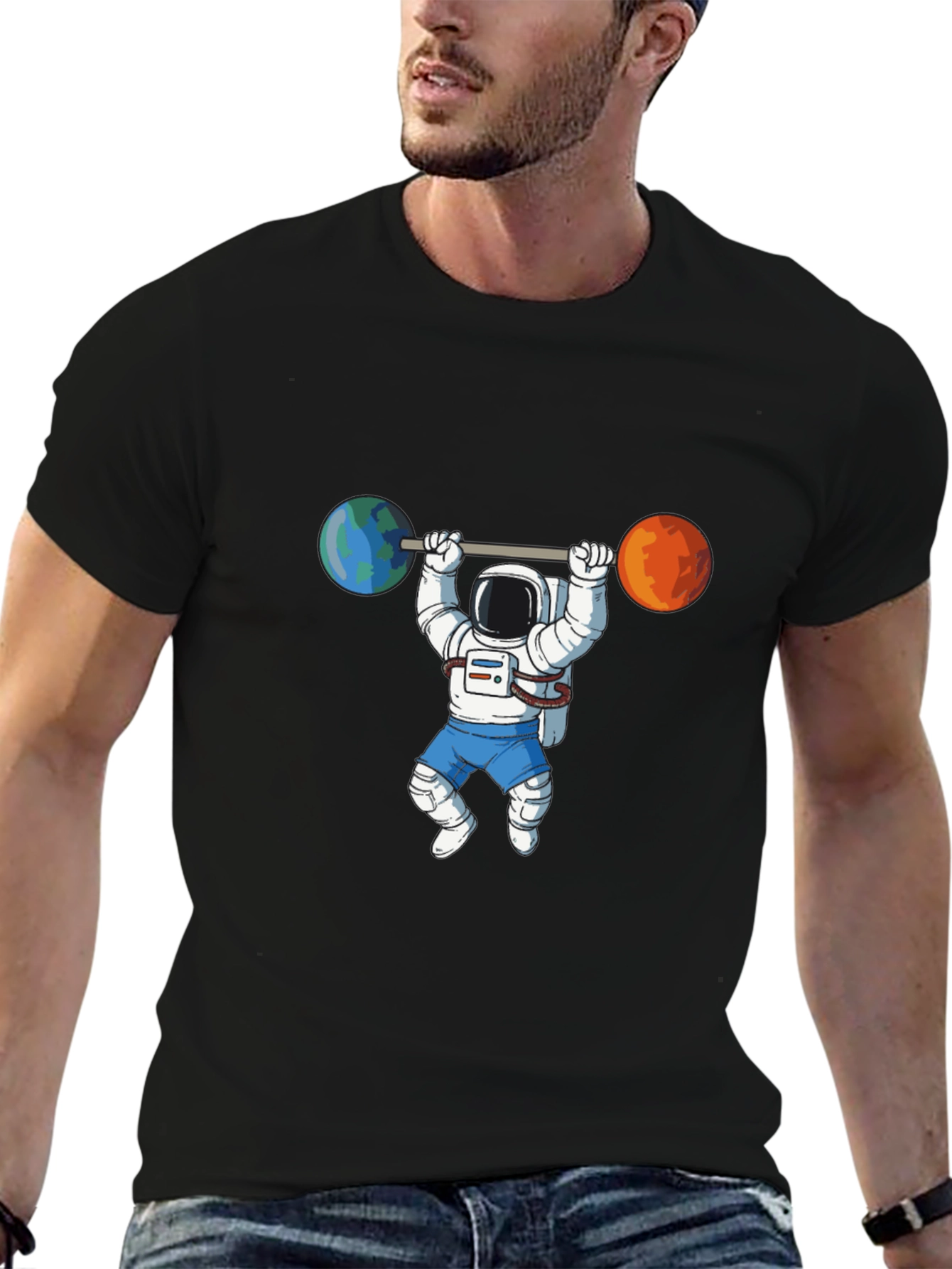 Astronaut Lifting Planets Graphic Tee